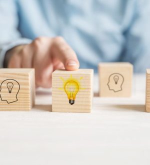 concept-creative-idea-innovation-hand-choose-wooden-cube-block-with-head-human-symbol-light-bulb-icon